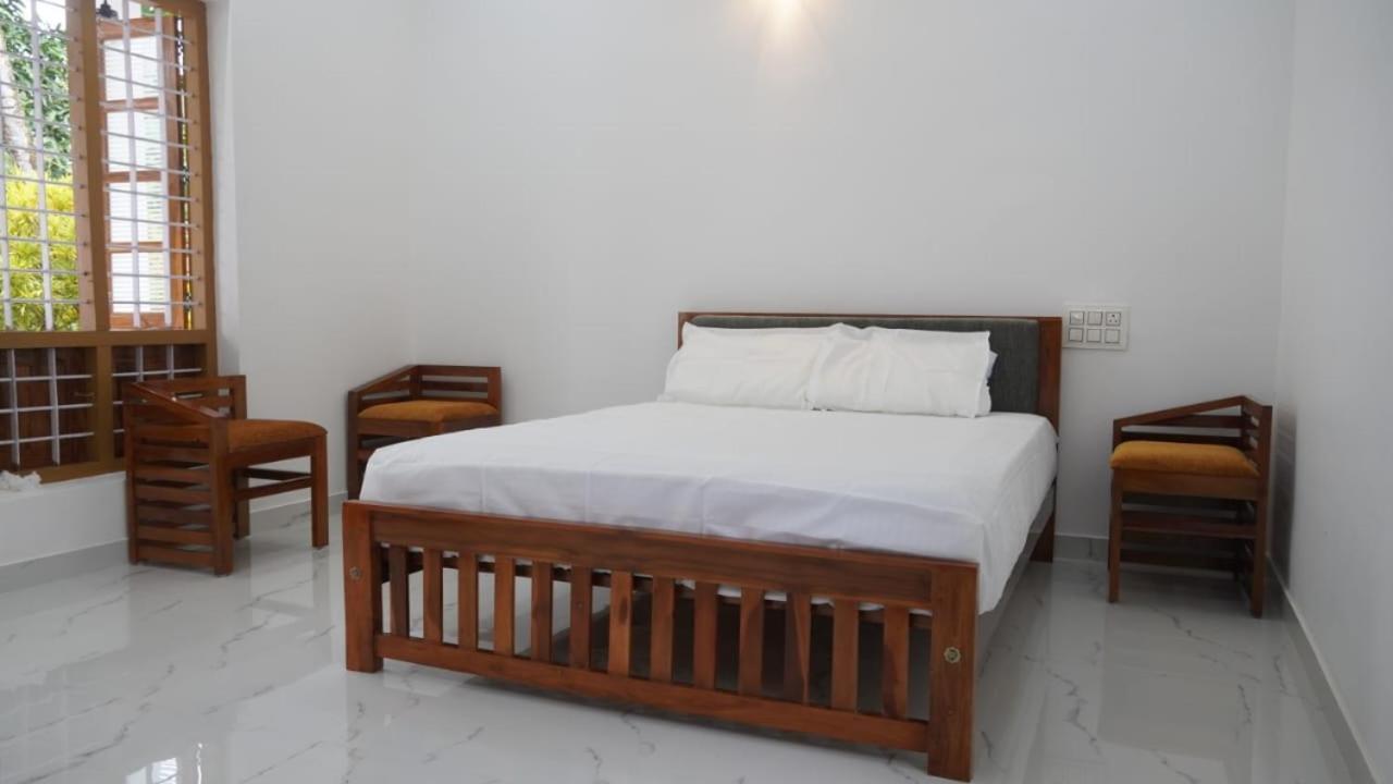 Munroe Heritage Inn Mundrothuruth Стая снимка